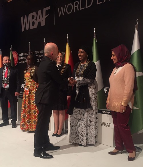 Hauwa Yabani receives her High Commissioner's medallion
