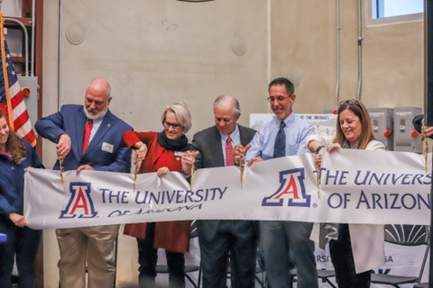 The University of Arizona team cutting the ribbon