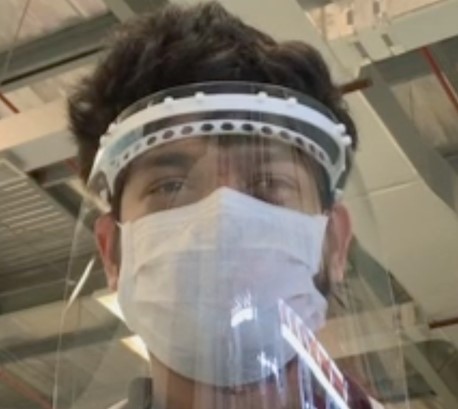 An Immensa staff member wearing one of their 3D printed face masks