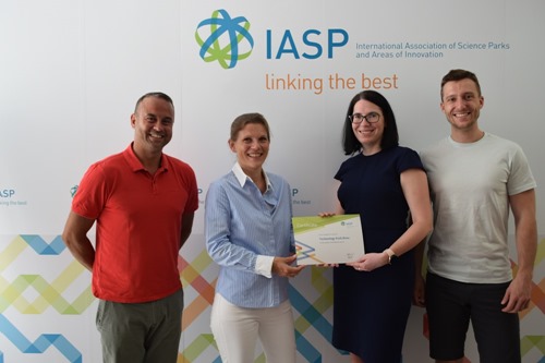 The Brno management team collect their membership certificate from IASP CEO Ebba Lund