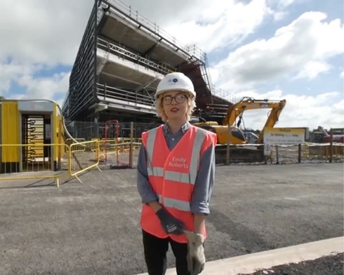 Emily Roberts outside Menai Science Park during the build stage