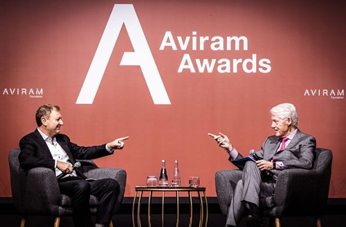 Former president Clinton on stage during the awards