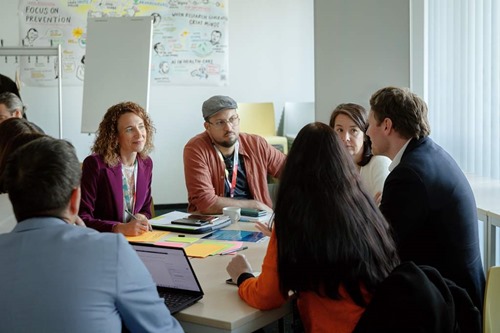 IASP members engaging in group work