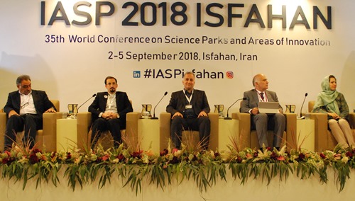 Outgoing WANA President Ali Motamedzadegan (centre) on stage at IASP Isfahan