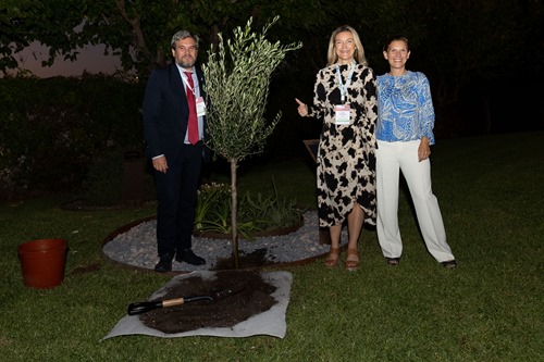 Luis Perez, Lena Miranda and Ebba Lund after planting the olive tree