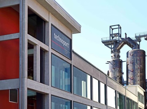 The Technoport building with one of the Belval blast furnances in the background